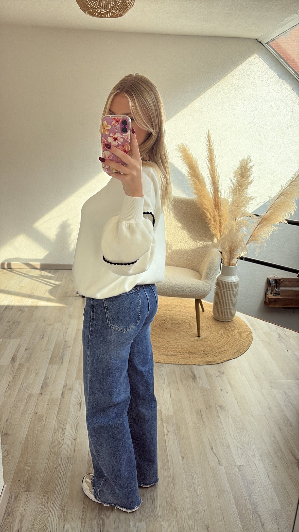 Witte sweater