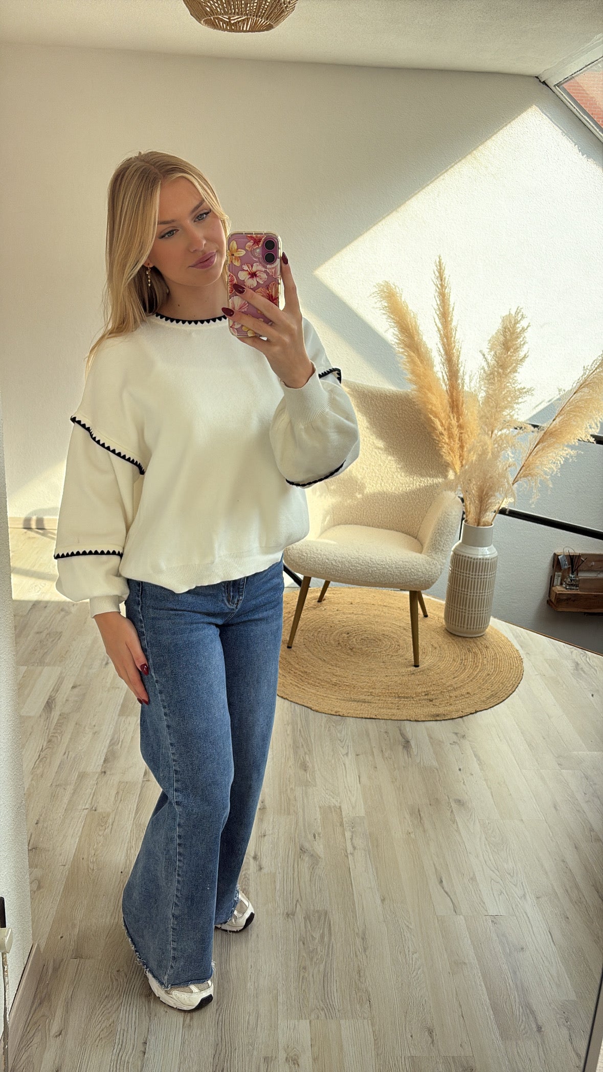 Witte sweater
