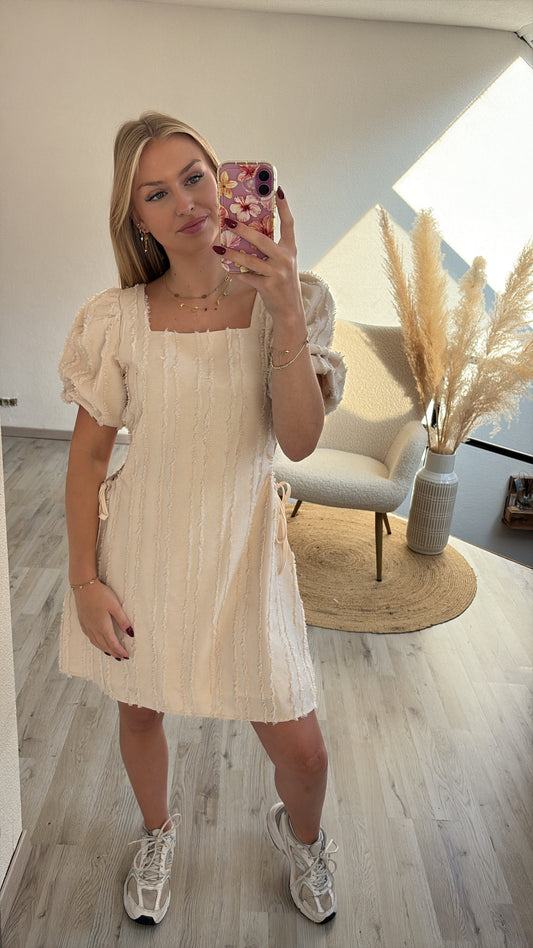 Beige jurk cut outs