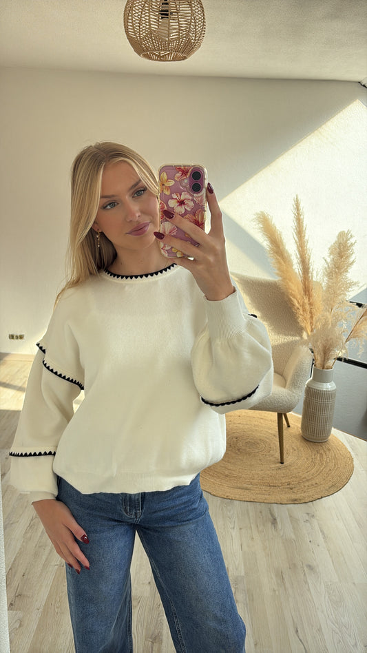 Witte sweater