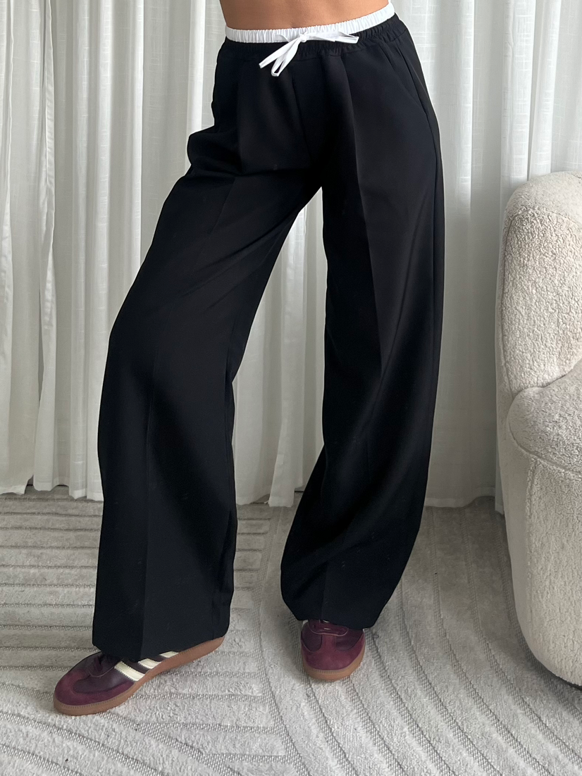 Zwarte pantalon band