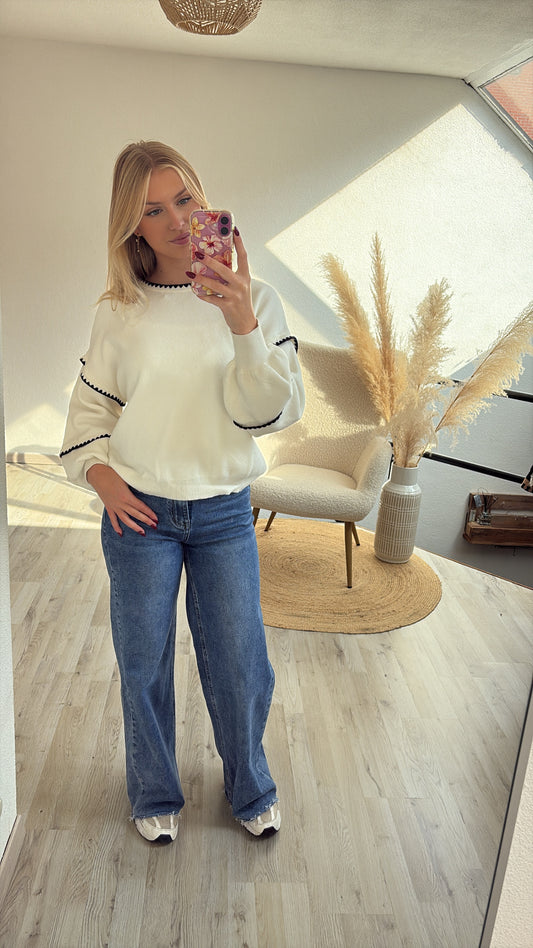 Witte sweater