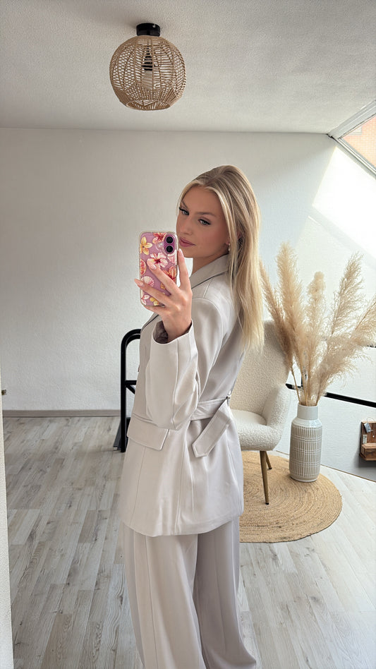 Beige kostuum