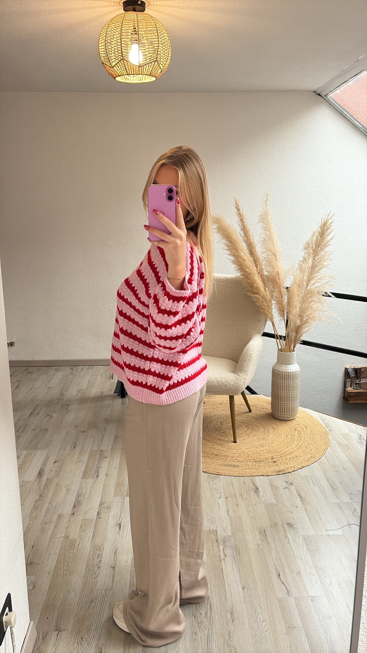 Roze gestreepte trui