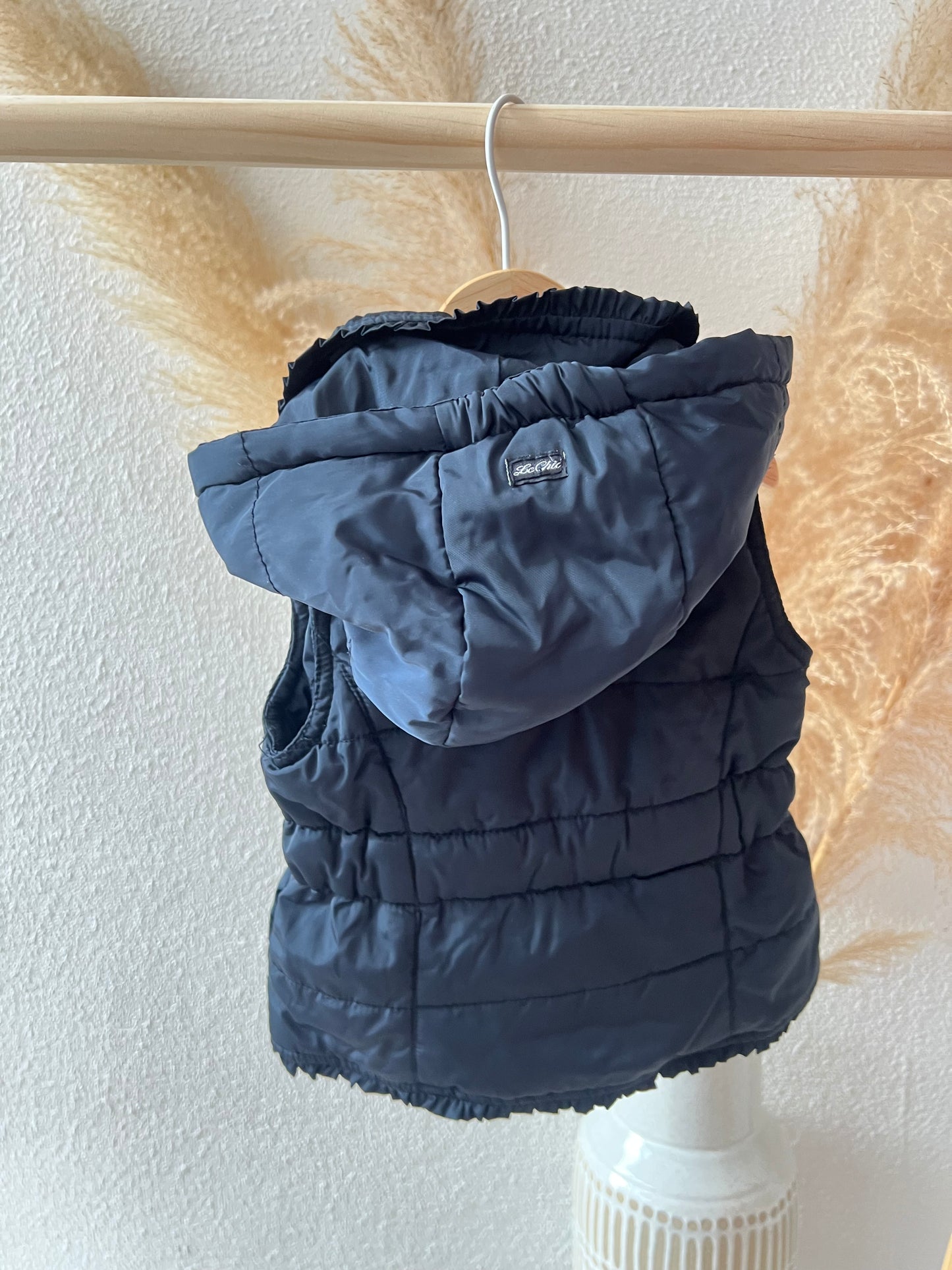 Blauwe bodywarmer